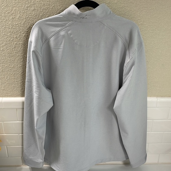 Golf Windbreaker. NEW w/out tags . Lined  and textured fabric . Size Large - Picture 5 of 11